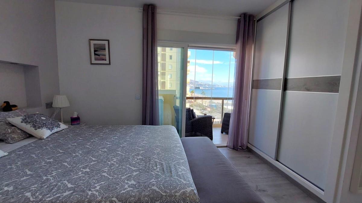 Luxury beachfront 2-bedroom flat in Fuengirola with panoramic sea views, ideal for retirement or investment, with high holiday rental profitability and a tourist license. Contact us to visit!