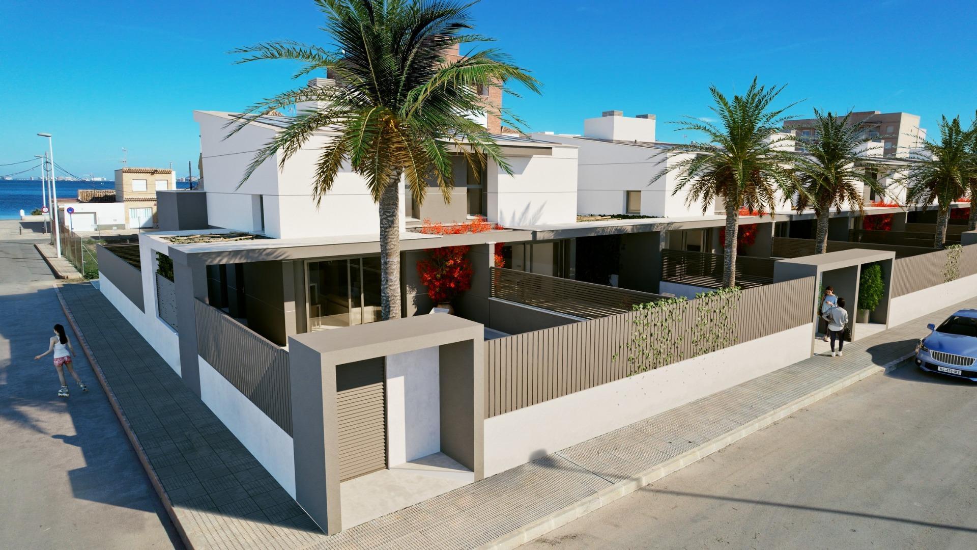 New build semi-detached villas with 3 bedrooms and 3 bathrooms in Los Nietos, Murcia. Elegant interiors, fully equipped kitchen, private pool, solarium, and solar panels. Located near the sandy beach of Los Nietos on the Mar Menor.